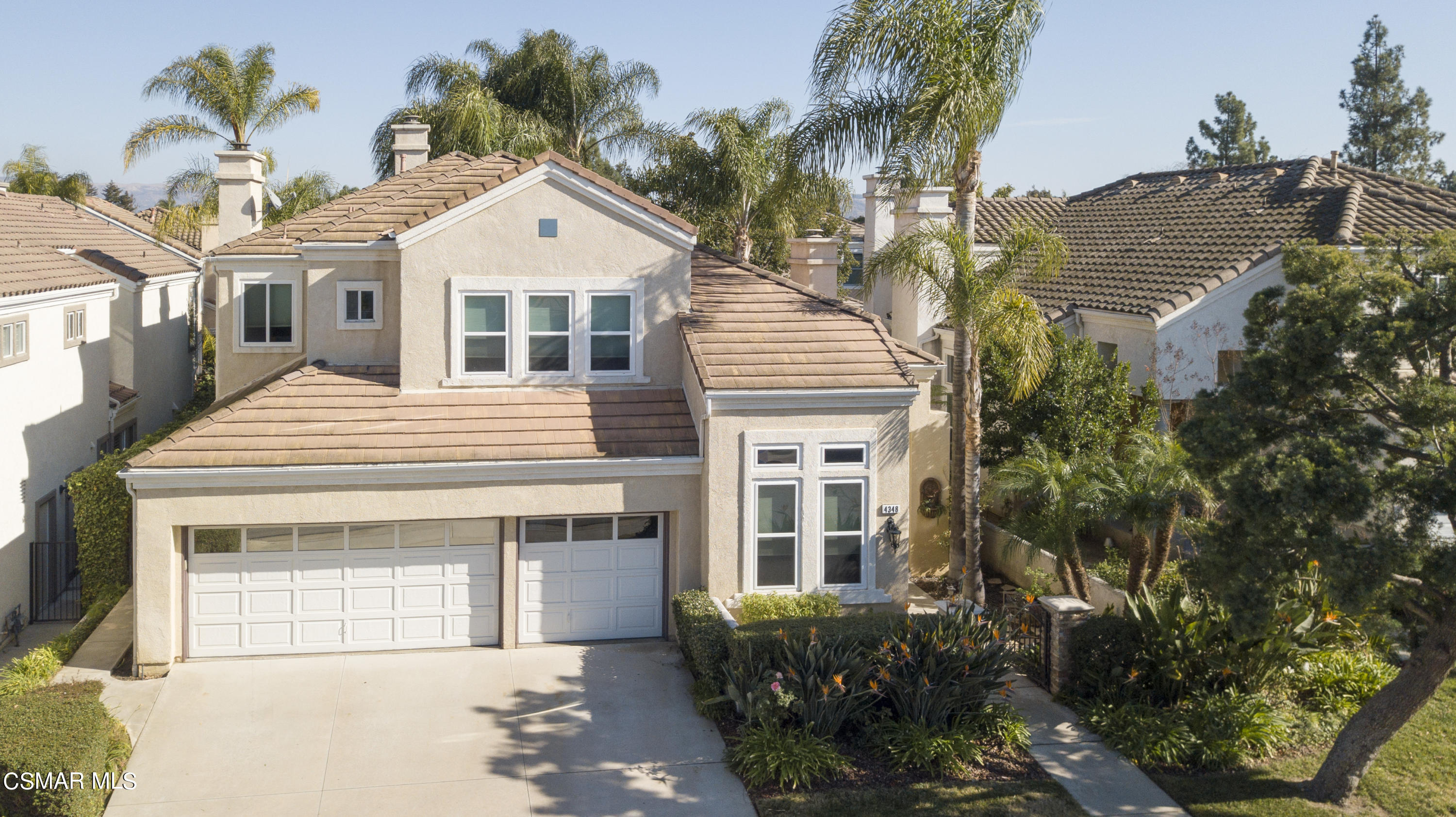 4348 Timberdale Road Moorpark, CA 93021 - Photo 35 of 35 a front view of a house with a garden