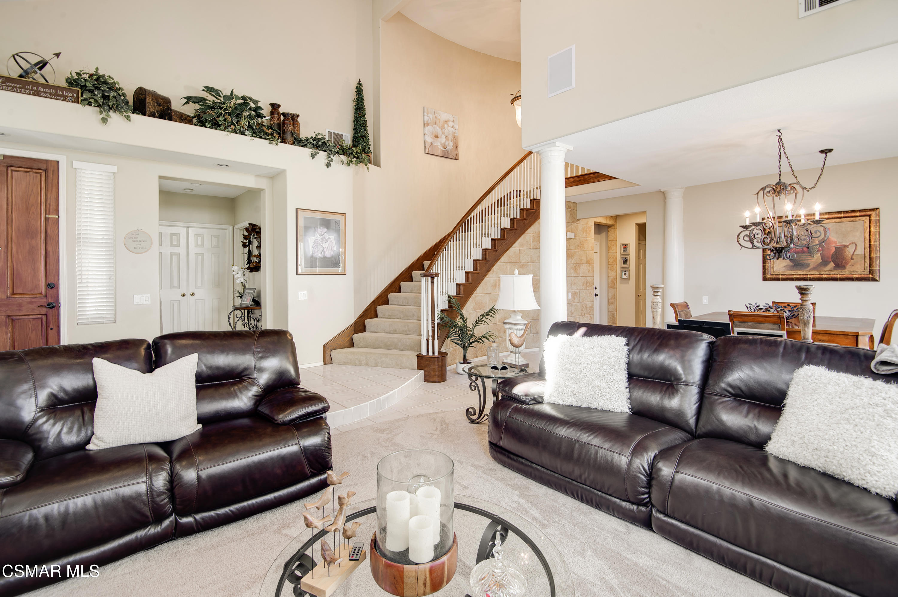 4348 Timberdale Road Moorpark, CA 93021 - Photo 5 of 35 a living room with furniture or couch and a chandelier