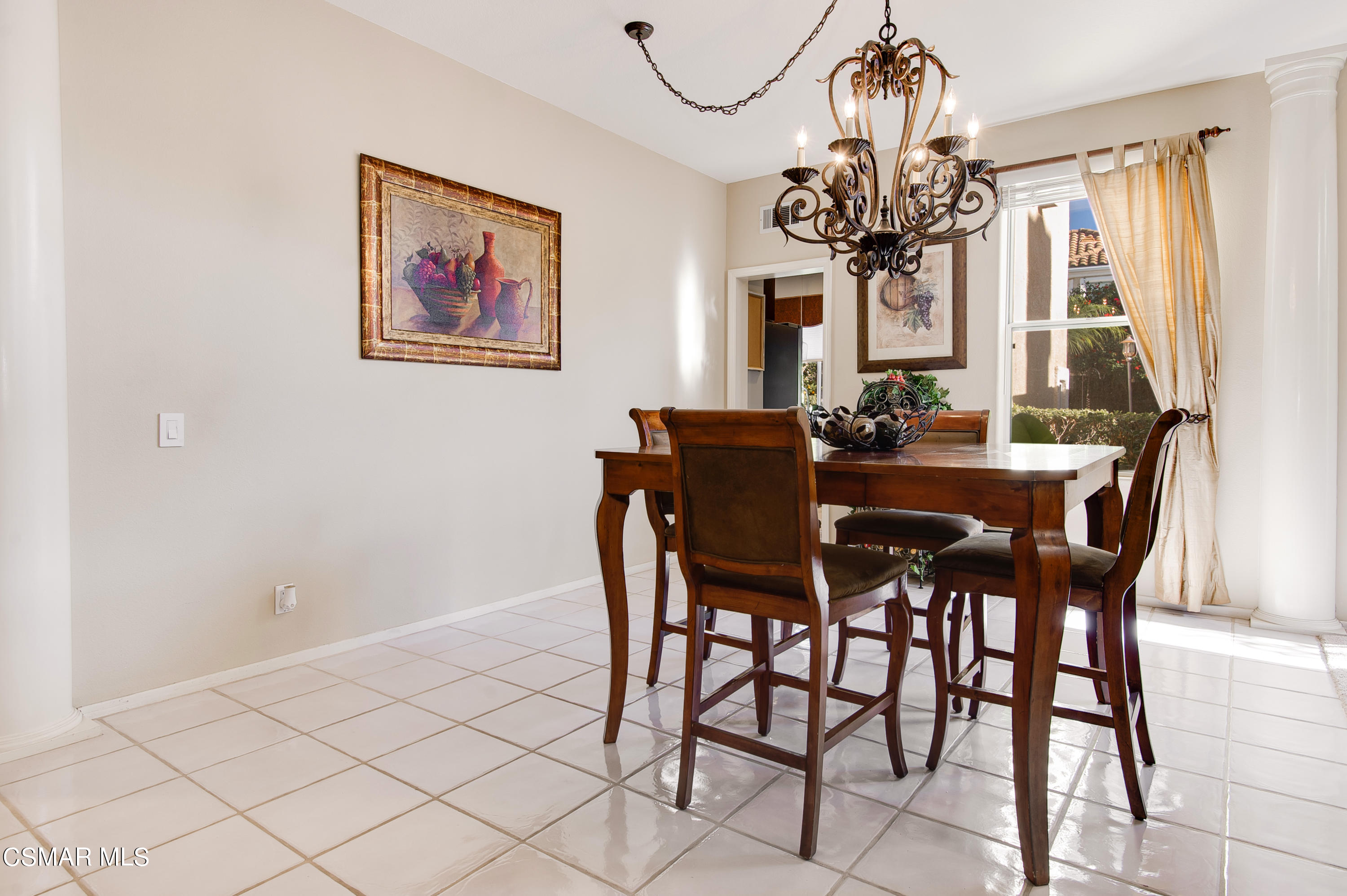 4348 Timberdale Road Moorpark, CA 93021 - Photo 9 of 35 a view of a dining room with furniture and chandelier