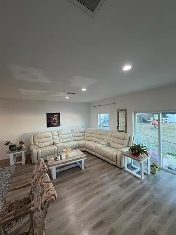 a living room with furniture and a couch