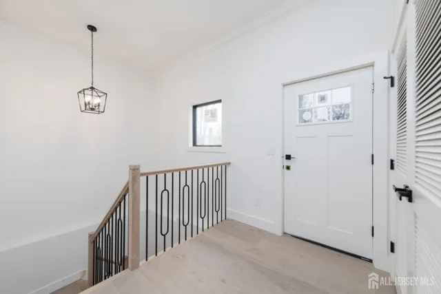 a view of a hallway with windows