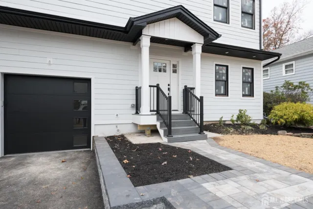 a front view of a house with street