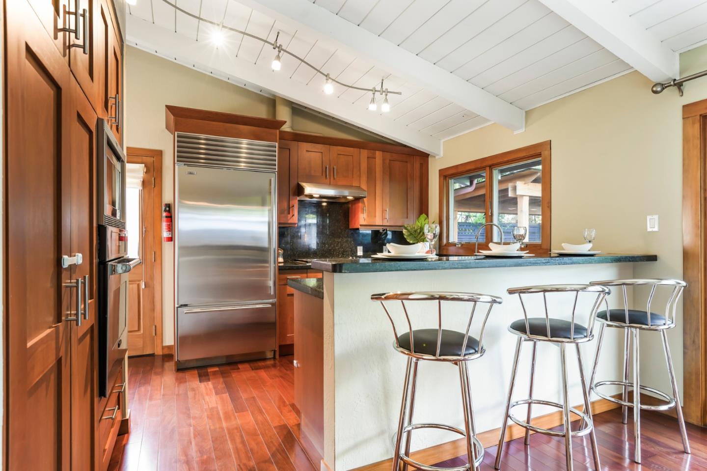 2417 Johnson Place Santa Clara, CA 95050 - Photo 11 of 30 a kitchen with stainless steel appliances granite countertop a refrigerator and wooden floor