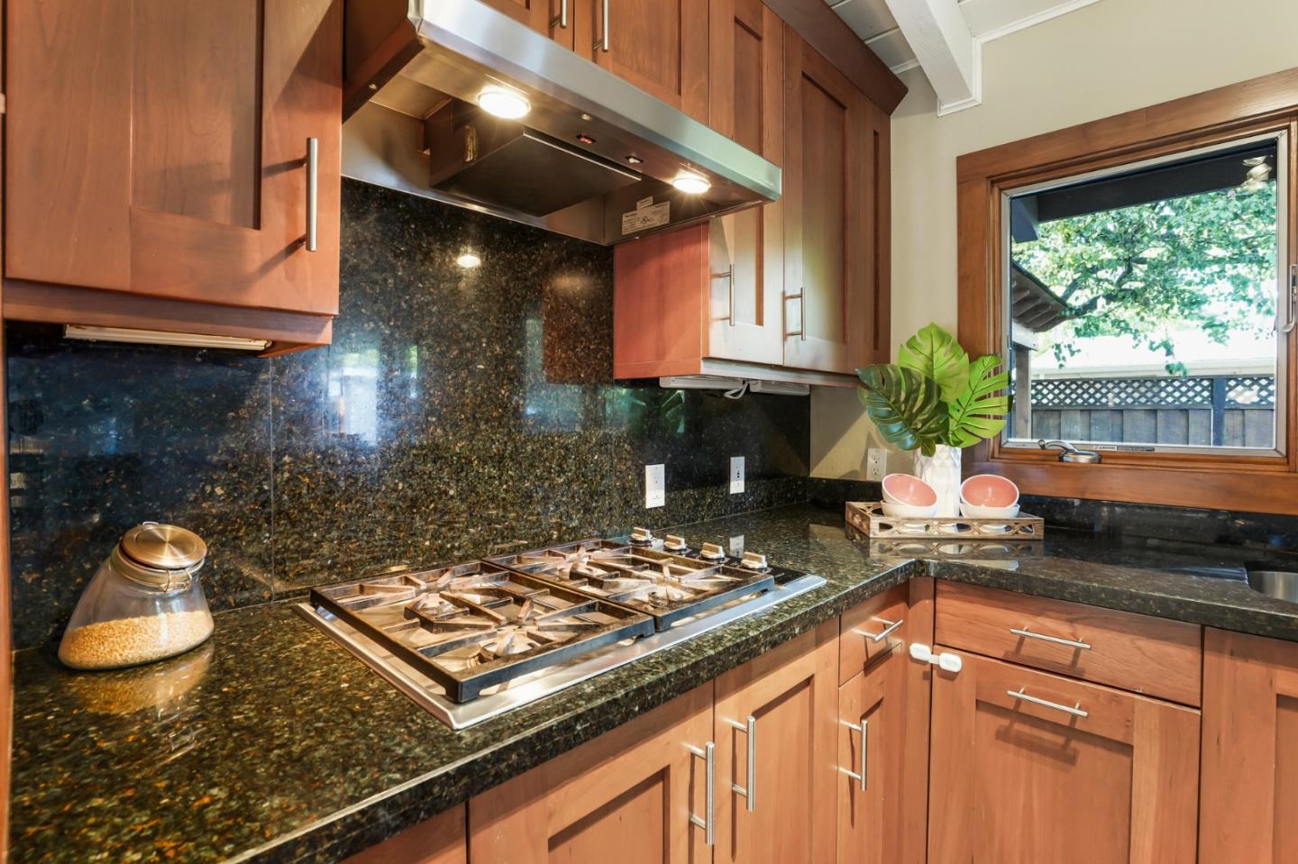 2417 Johnson Place Santa Clara, CA 95050 - Photo 12 of 30 a kitchen with a stove a sink and a cabinets