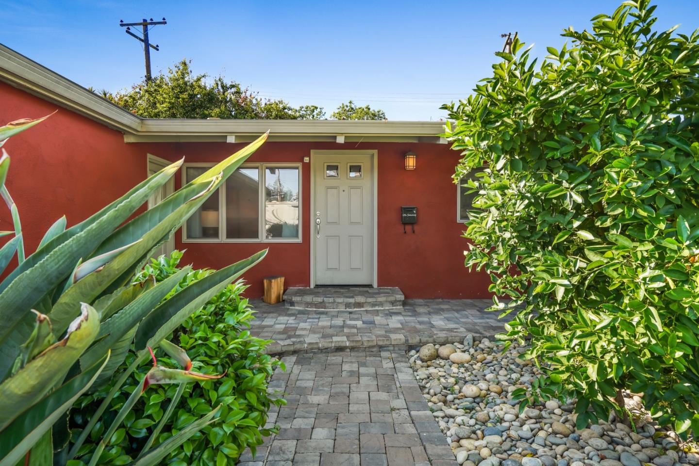 2417 Johnson Place Santa Clara, CA 95050 - Photo 2 of 30 a front view of a house with a yard