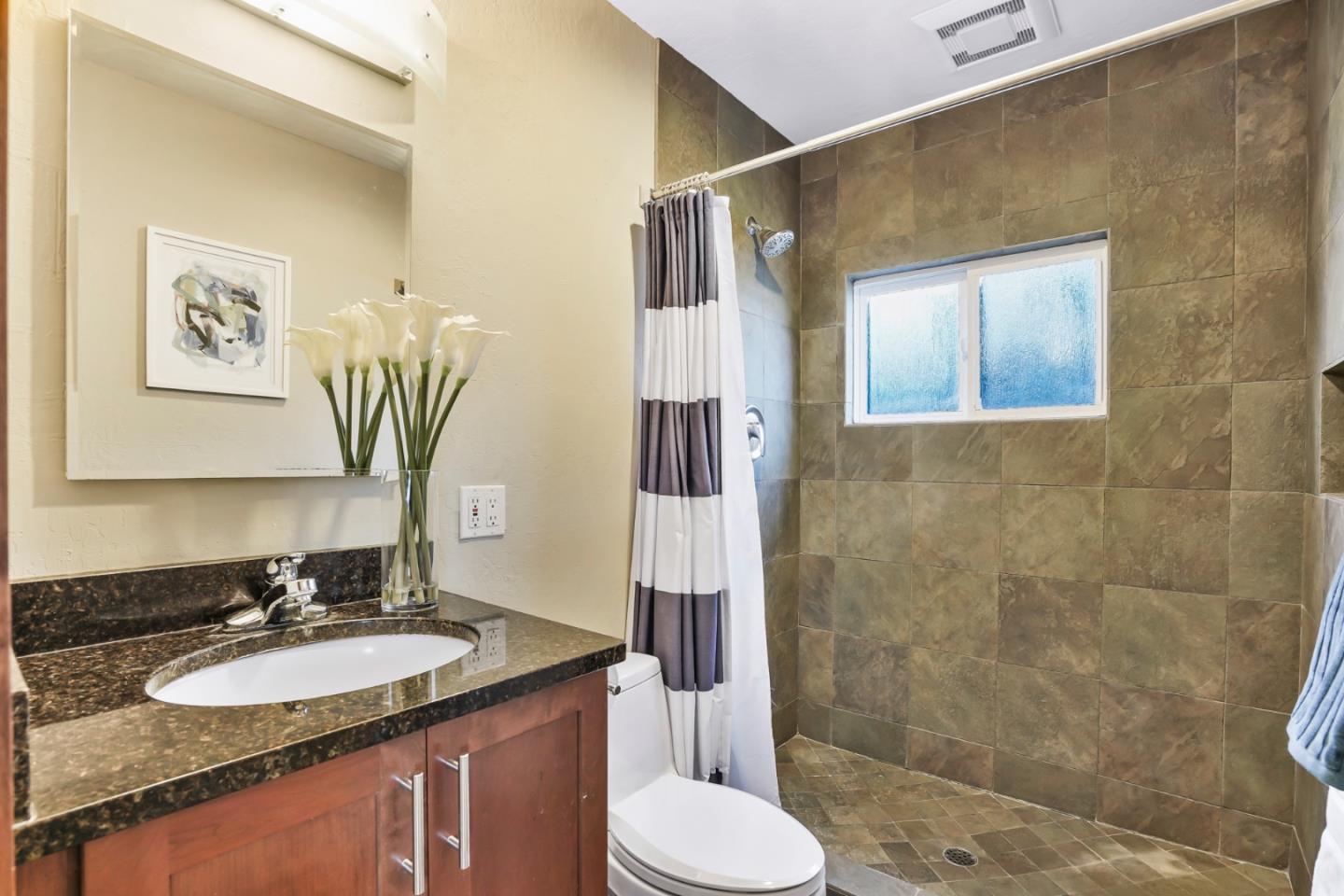 2417 Johnson Place Santa Clara, CA 95050 - Photo 23 of 30 a bathroom with a sink toilet and shower