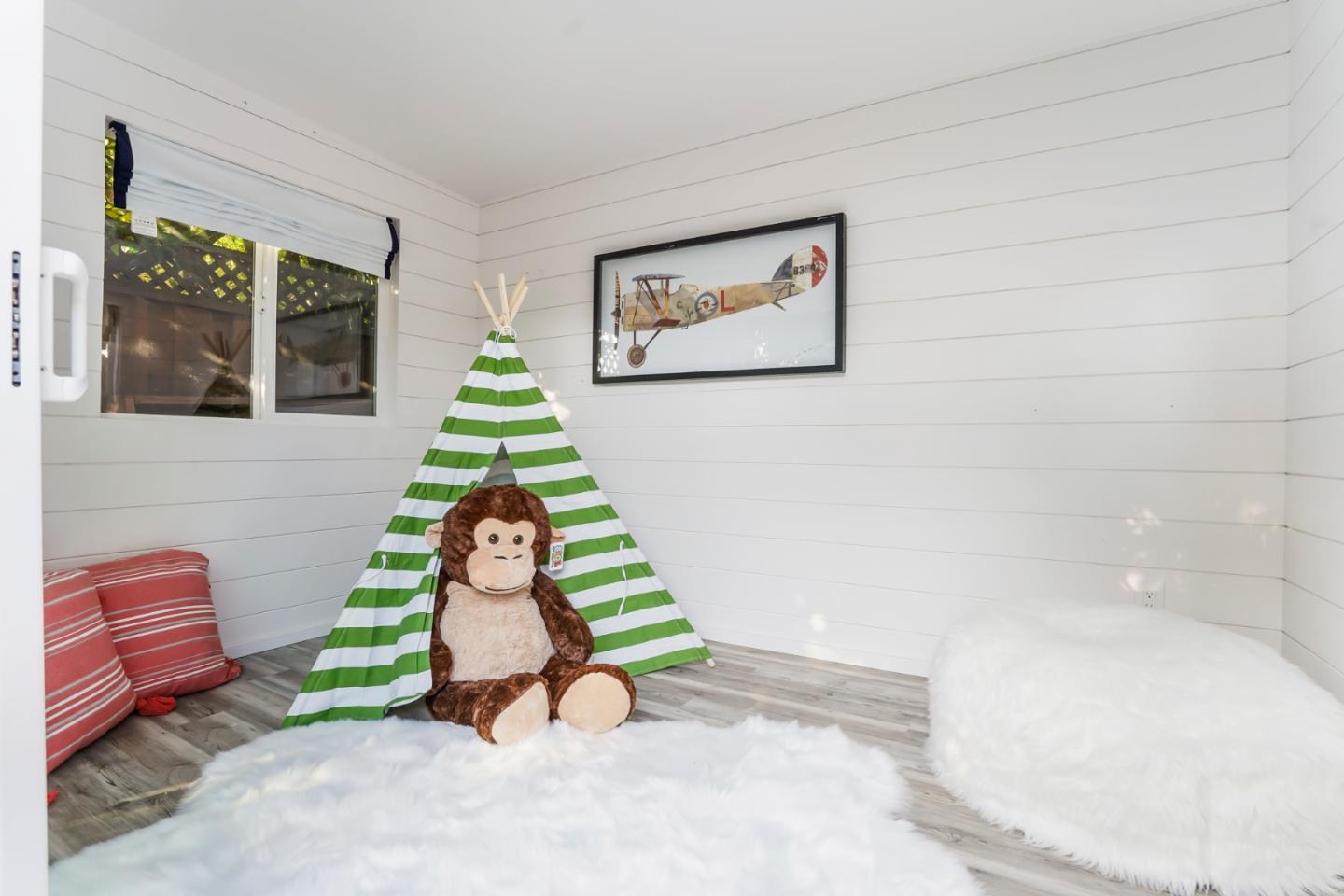 2417 Johnson Place Santa Clara, CA 95050 - Photo 29 of 30 a living room with a baby crib furniture and a large window