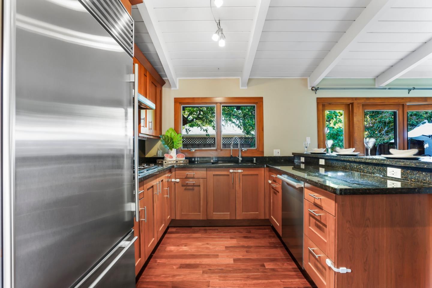 2417 Johnson Place Santa Clara, CA 95050 - Photo 8 of 30 a kitchen with stainless steel appliances granite countertop a sink and a refrigerator