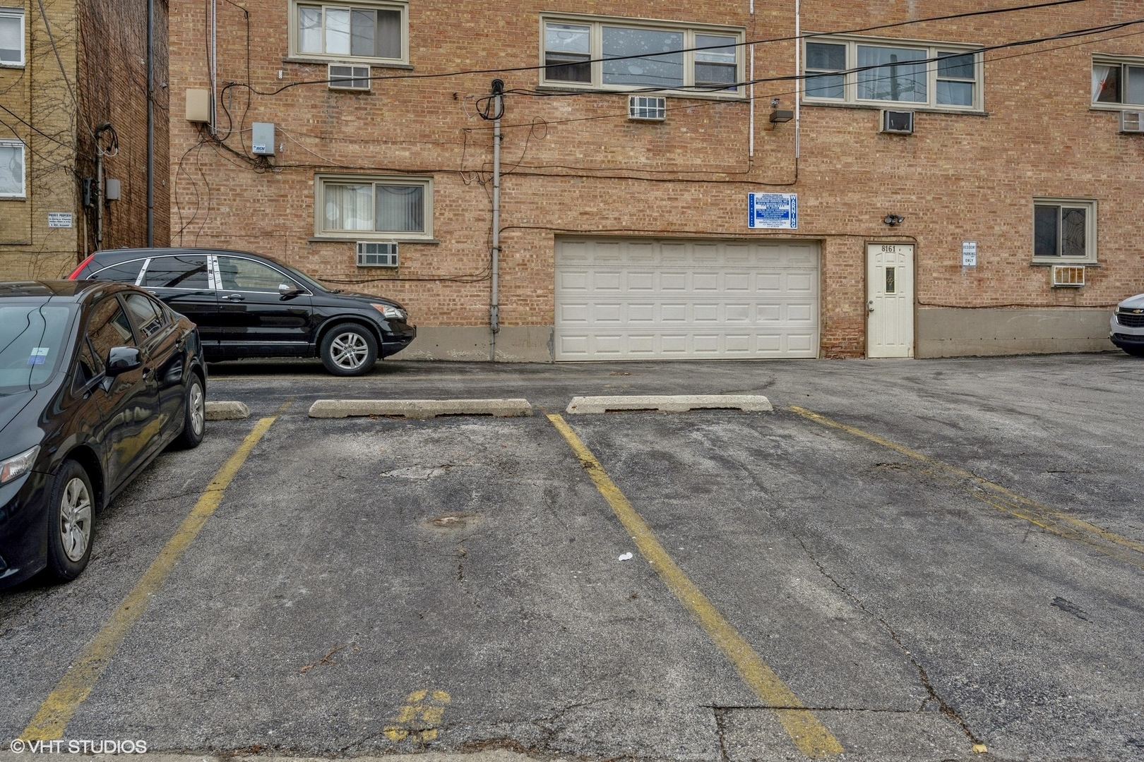 8161 Niles Center Road, Unit 3A Skokie, IL 60077 - Photo 12 of 12 a view of a car parked in front of a building
