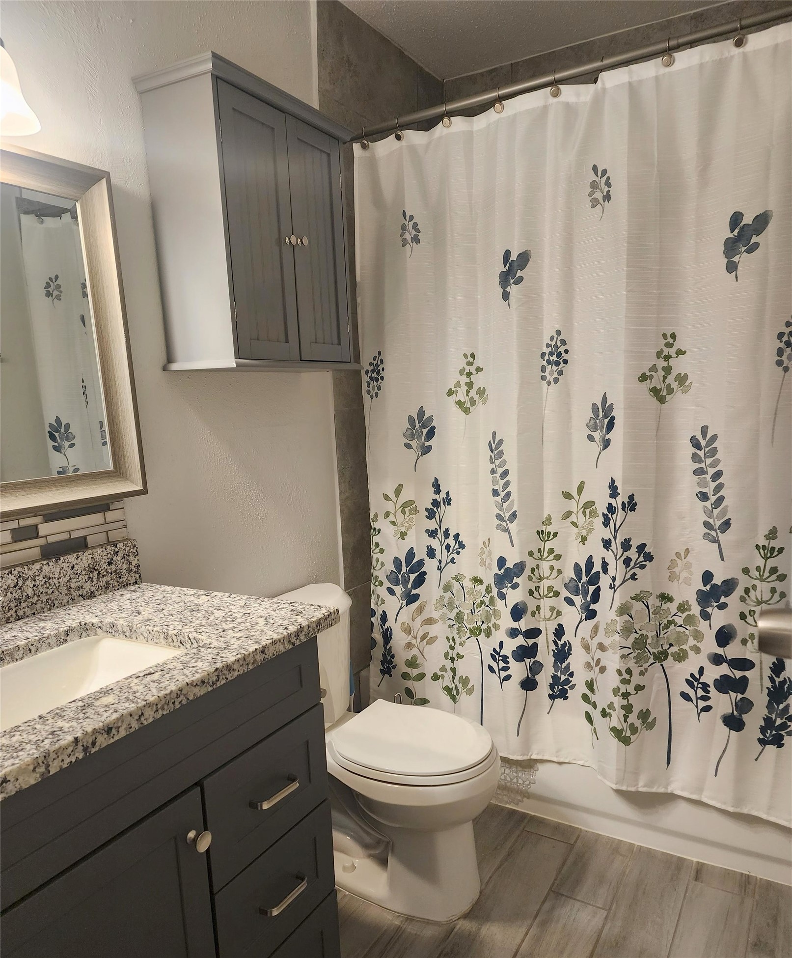 13151 Walden Road, Unit 175 Montgomery, TX 77356 - Photo 3 of 6 The bathroom with granite counter tops and a wonderful shower/tub combo.