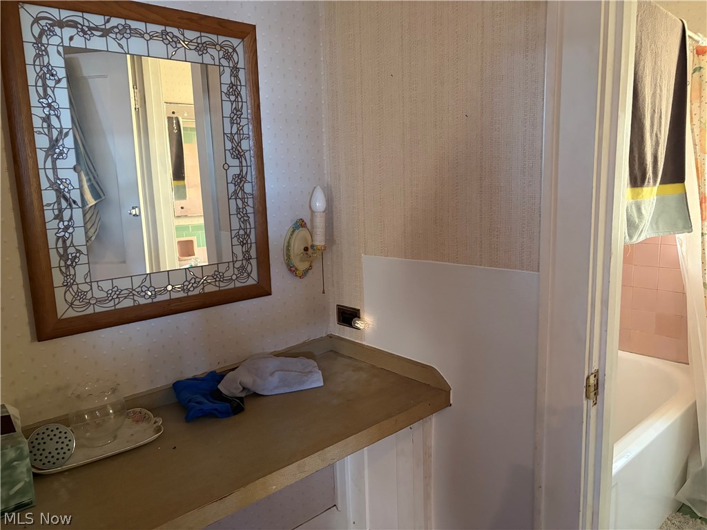 2031 Ridgewood Avenue Alliance, OH 44601 - Photo 14 of 22 ENTRANCE TO THE UPSTAIRS BATH WITH VANITY AREA AND A CLOSET