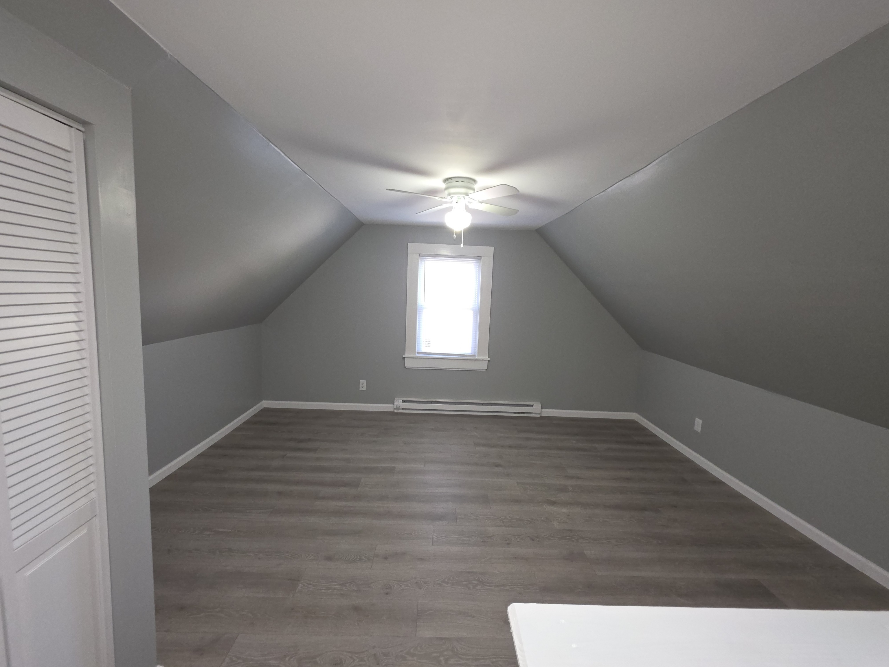 15 Keller Avenue Enfield, CT 06082 - Photo 12 of 13 a view of an empty room and window