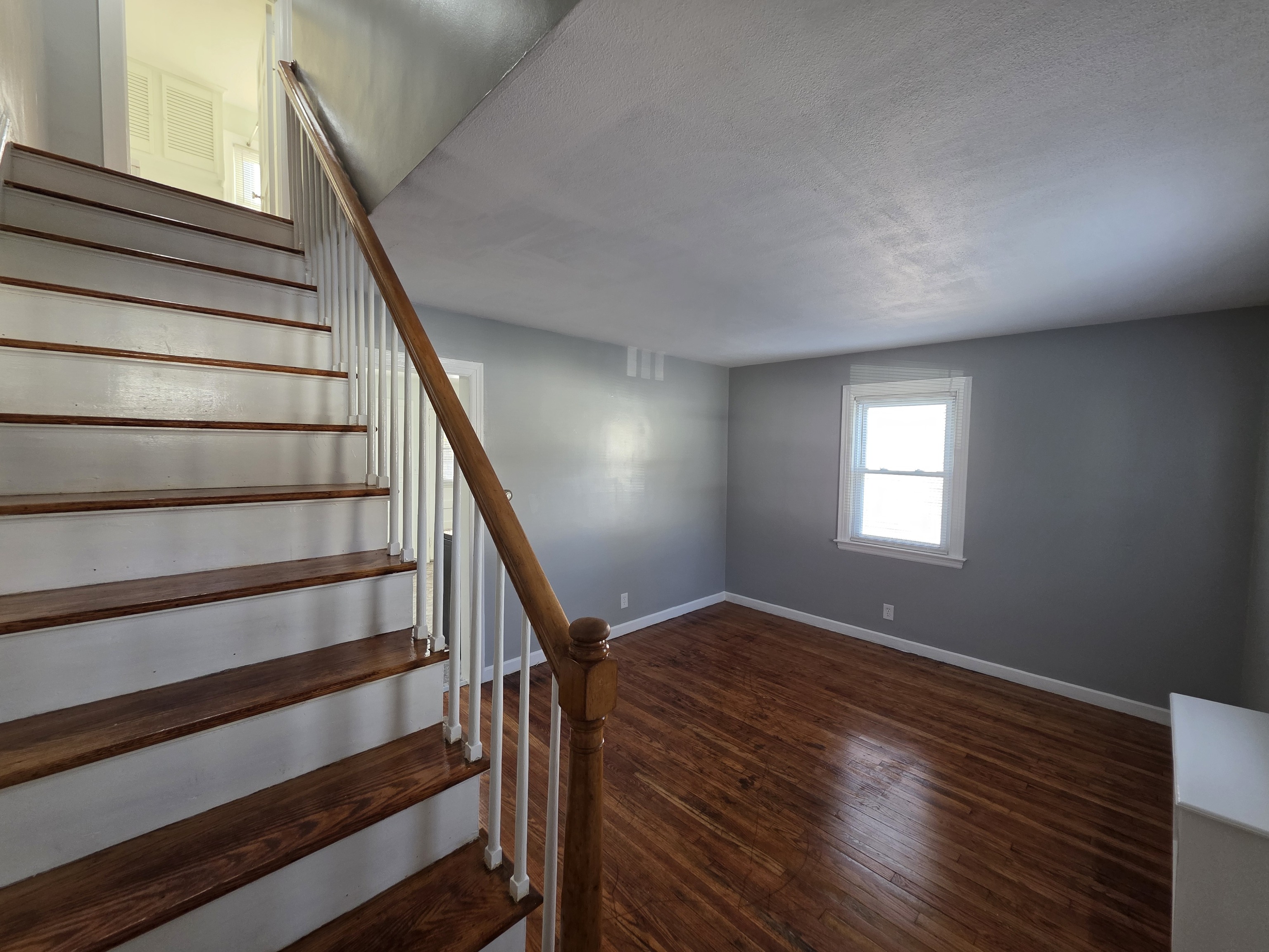 15 Keller Avenue Enfield, CT 06082 - Photo 2 of 13 a view of entryway with wooden floor and window
