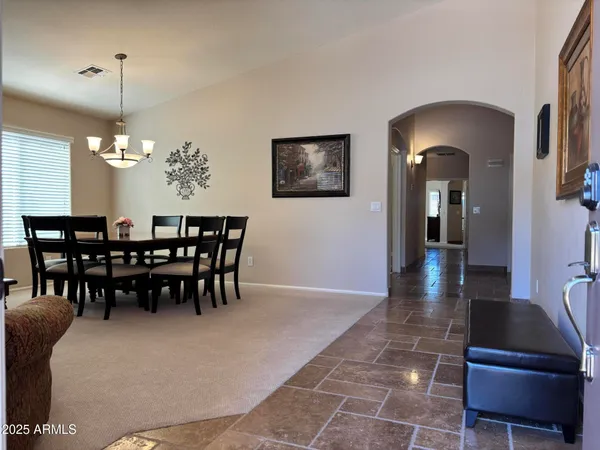 a view of a dining room with furniture