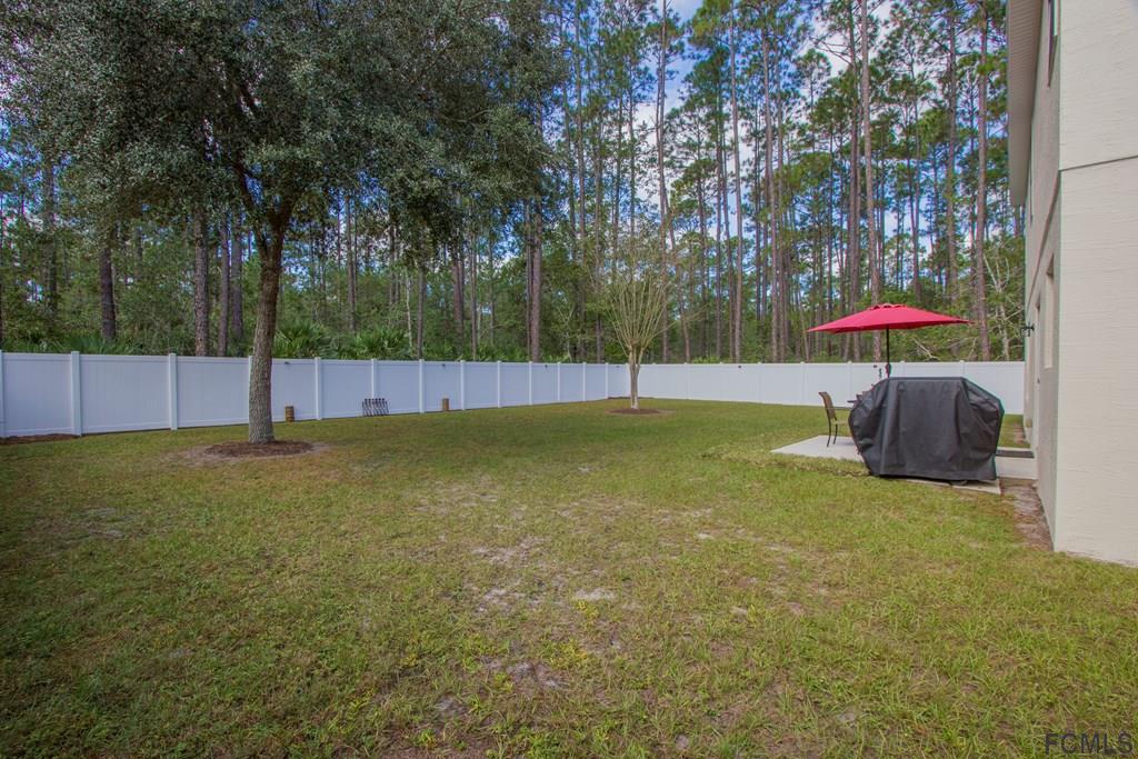 3 Riddle Place Palm Coast, FL 32164 - Photo 43 of 47 a view of a tennis court
