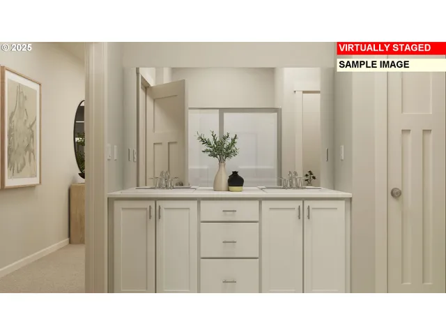 a bathroom with a sink vanity and a mirror