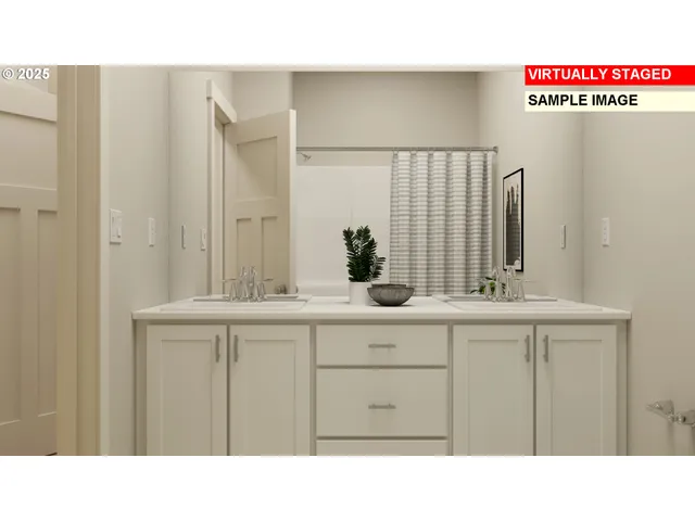 a black and white photo of a bathroom