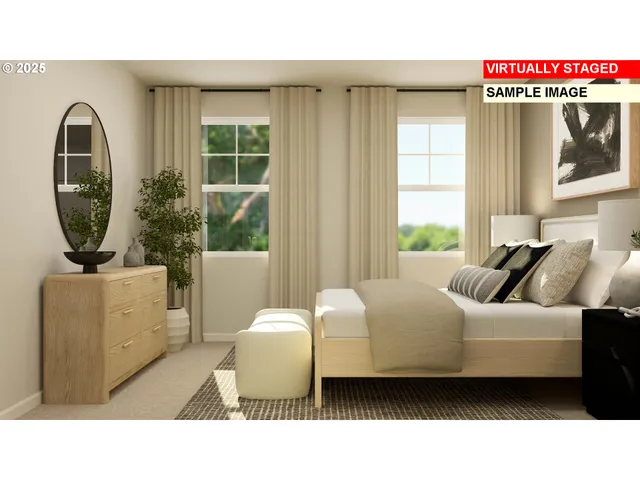 a living room with furniture a window and a mirror