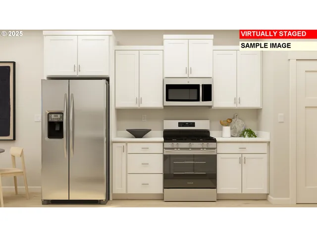 a kitchen with stainless steel appliances a refrigerator stove and microwave