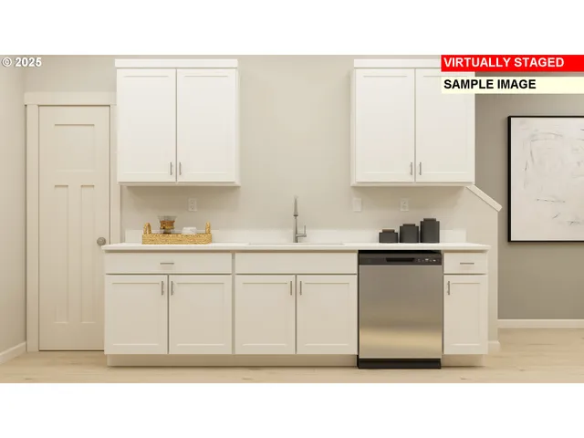 a kitchen with sink and cabinets