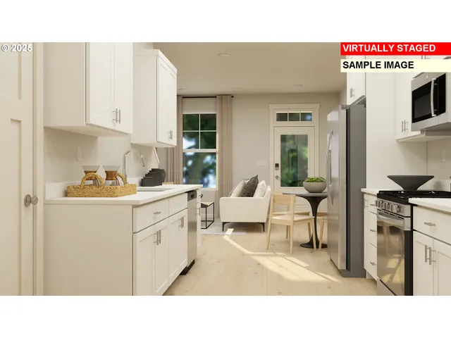 a kitchen with sink and cabinets