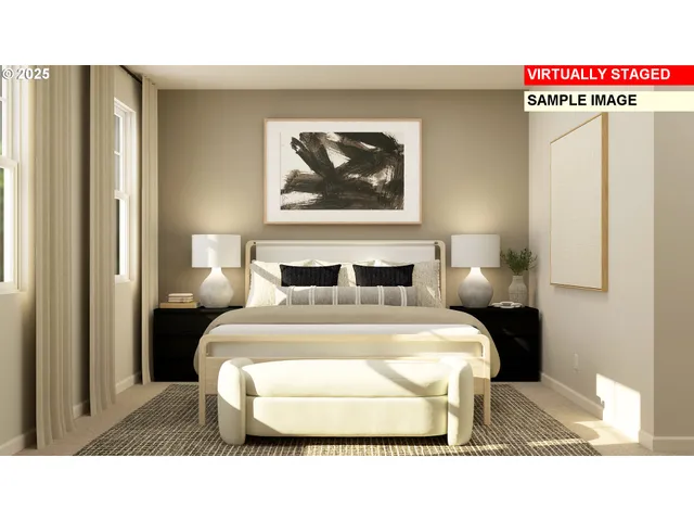 a bedroom with a bed and a painting on the wall