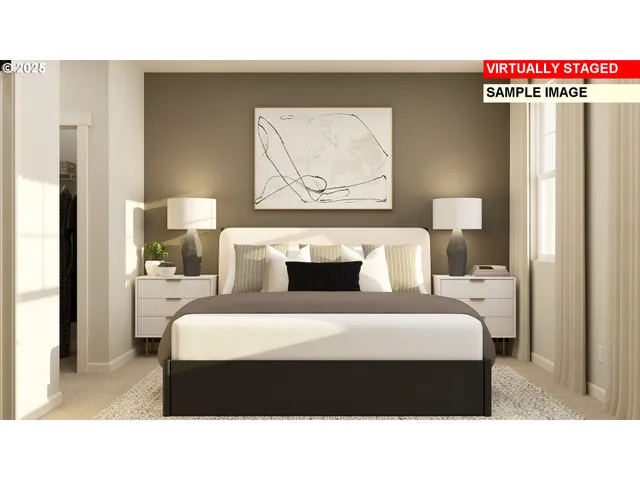 a bedroom with a bed and a painting on the wall