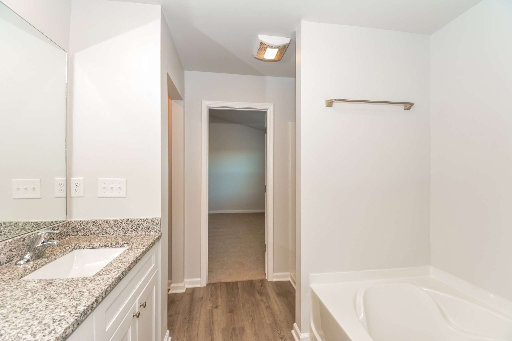 2425 Alberto Drive Murfreesboro, TN 37127 - Photo 12 of 17 a bathroom with a granite countertop tub sink and mirror