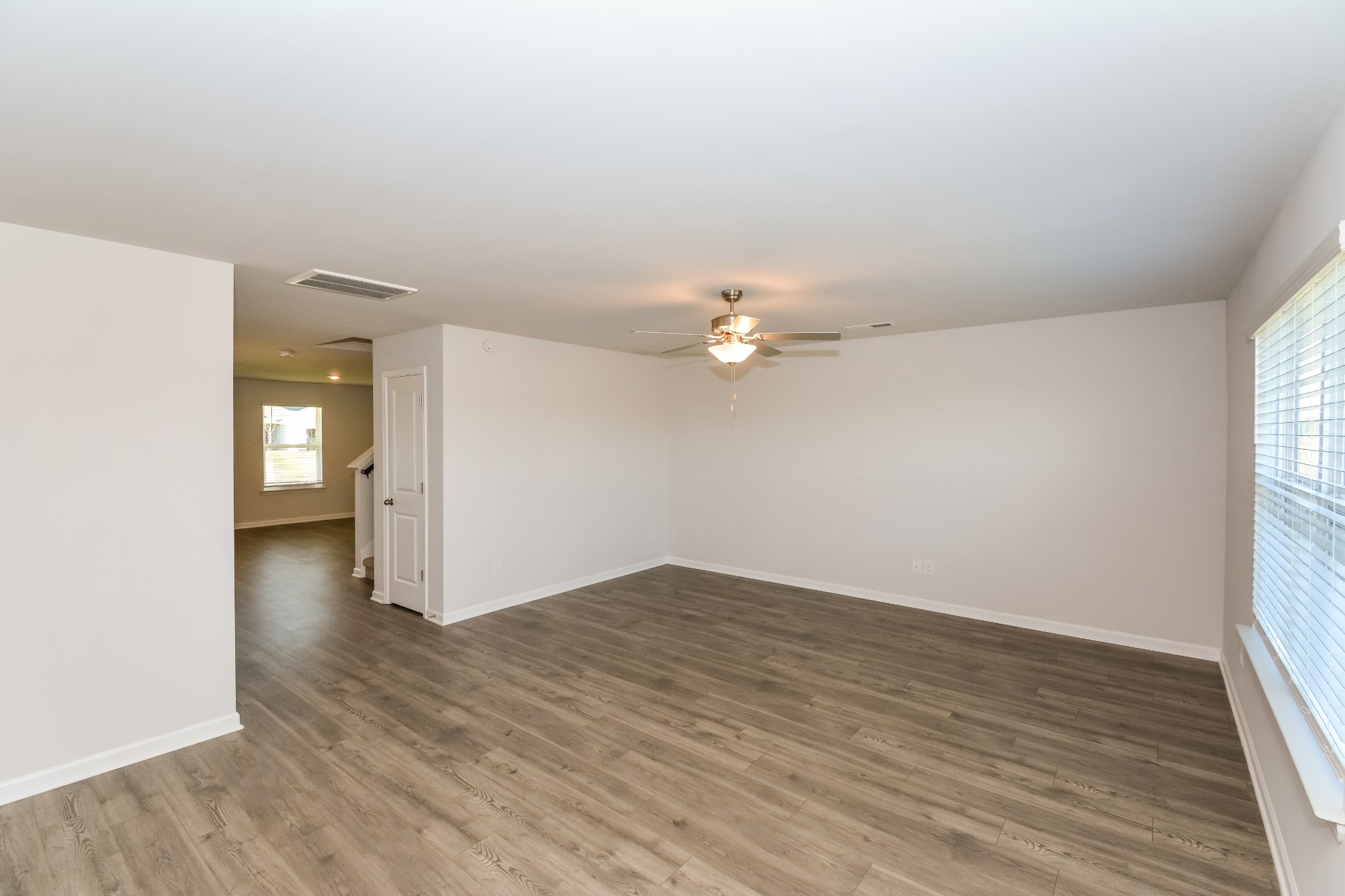 2425 Alberto Drive Murfreesboro, TN 37127 - Photo 4 of 17 a view of empty room with wooden floor and window