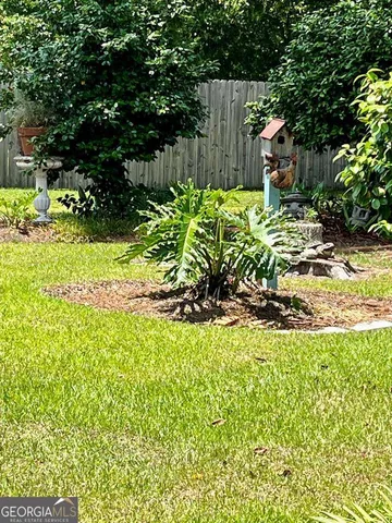 a view of a garden with a bench