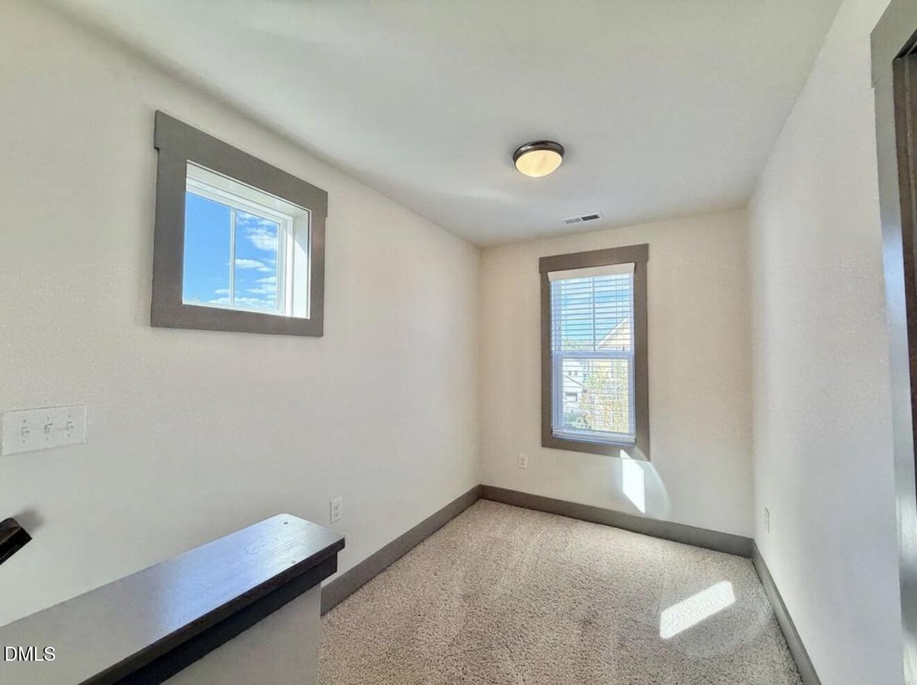 1529 Rhodeschool Drive Wendell, NC 27591 - Photo 15 of 36 a view of an empty room with a window