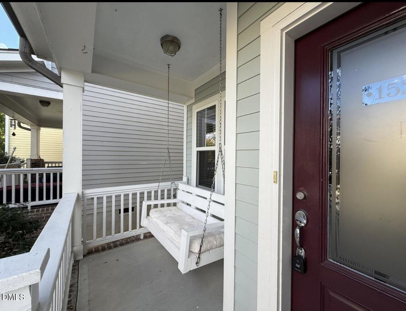 1529 Rhodeschool Drive Wendell, NC 27591 - Photo 3 of 36 a view of a balcony with chair