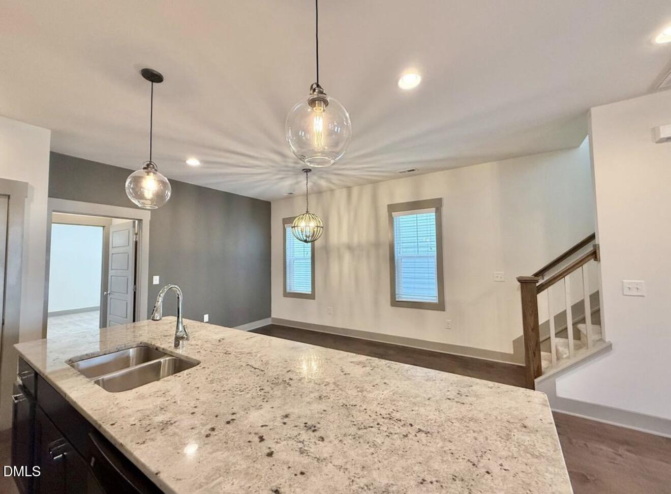 1529 Rhodeschool Drive Wendell, NC 27591 - Photo 7 of 36 a view of a kitchen center island and windows