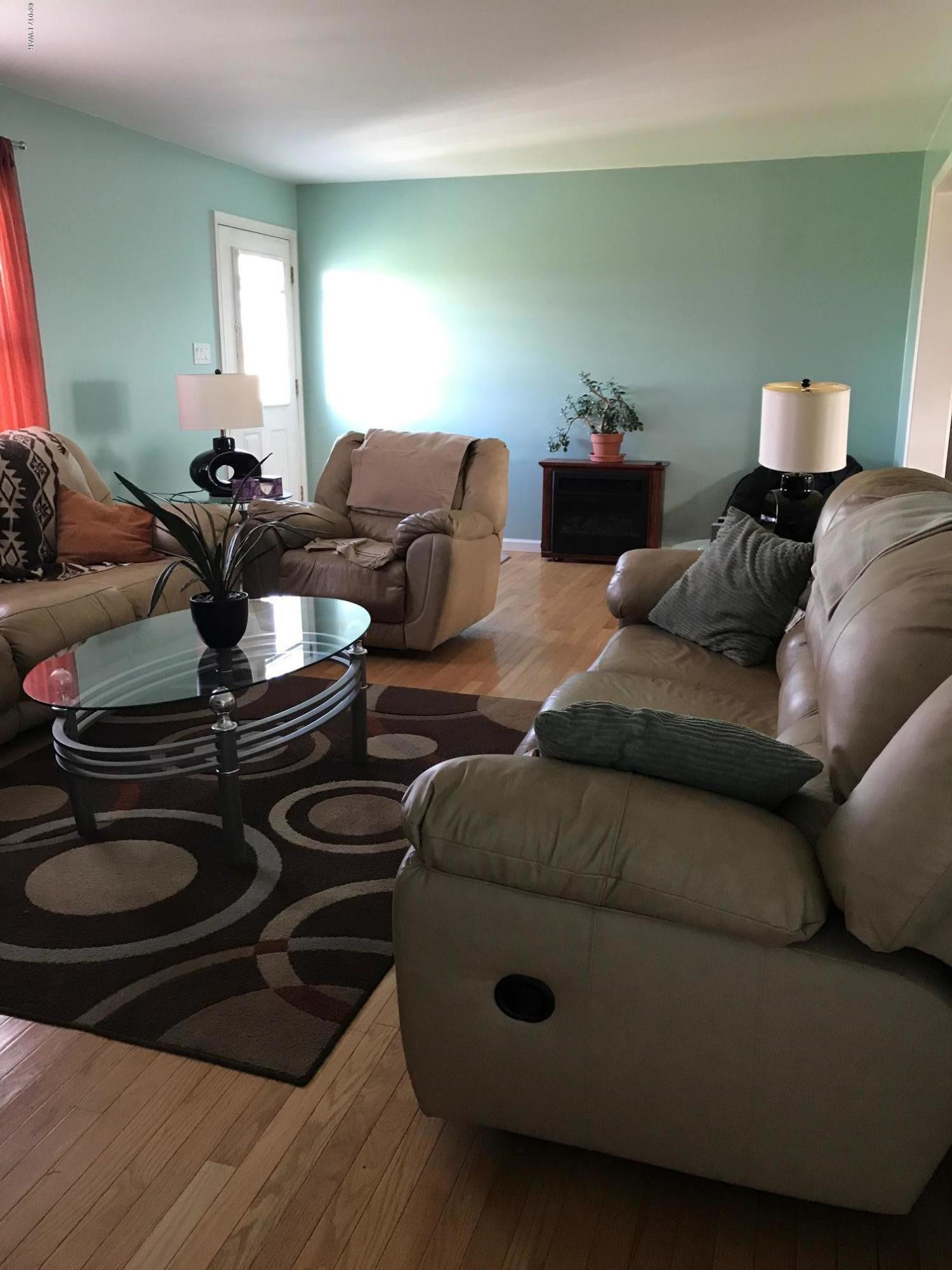 82 Slater Road Beach Lake, PA 18405 - Photo 6 of 28 a living room with furniture and a wooden floor
