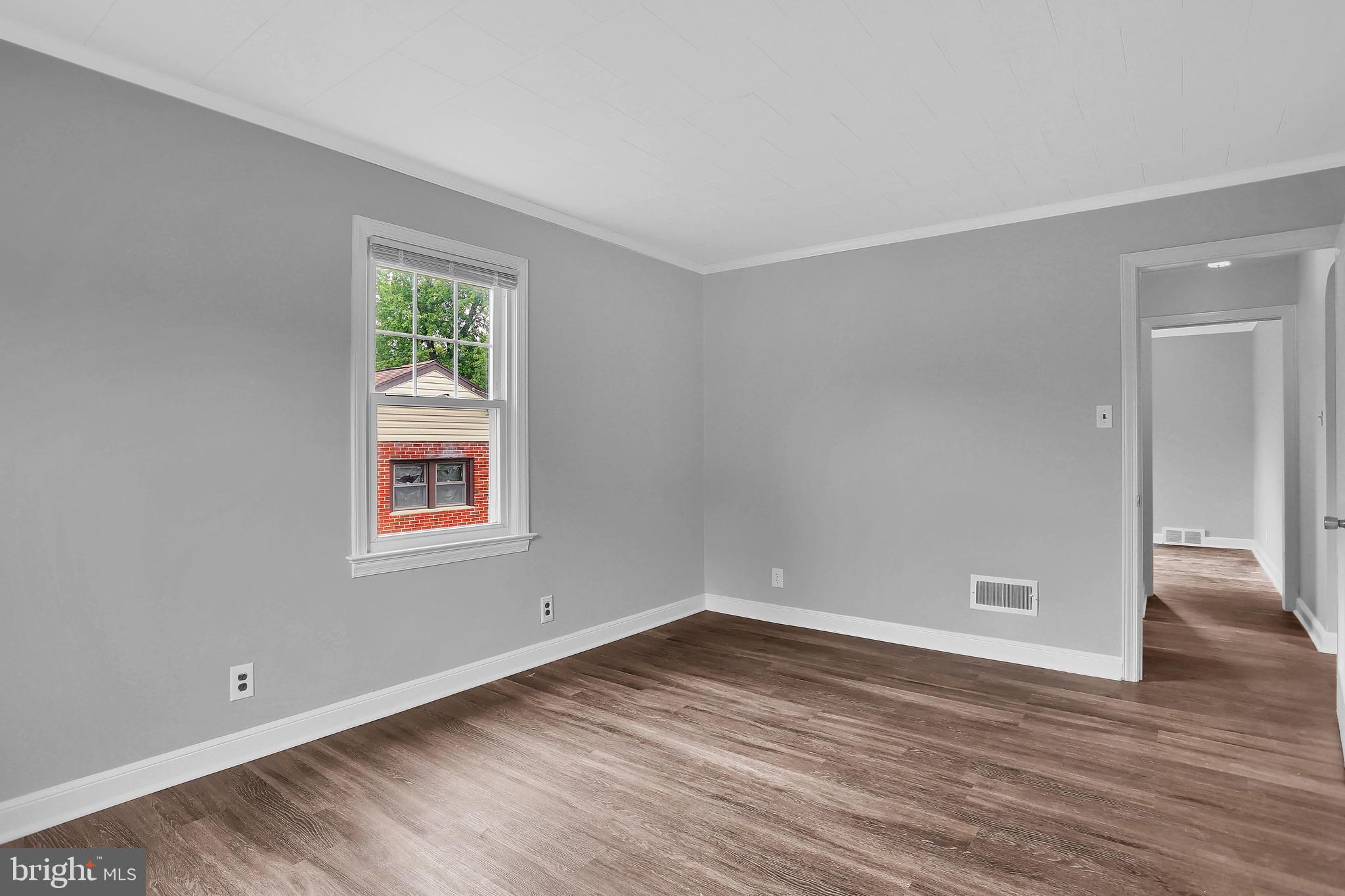 392 Waters Road York, PA 17403 - Photo 17 of 43 a view of empty room with wooden floor and fan
