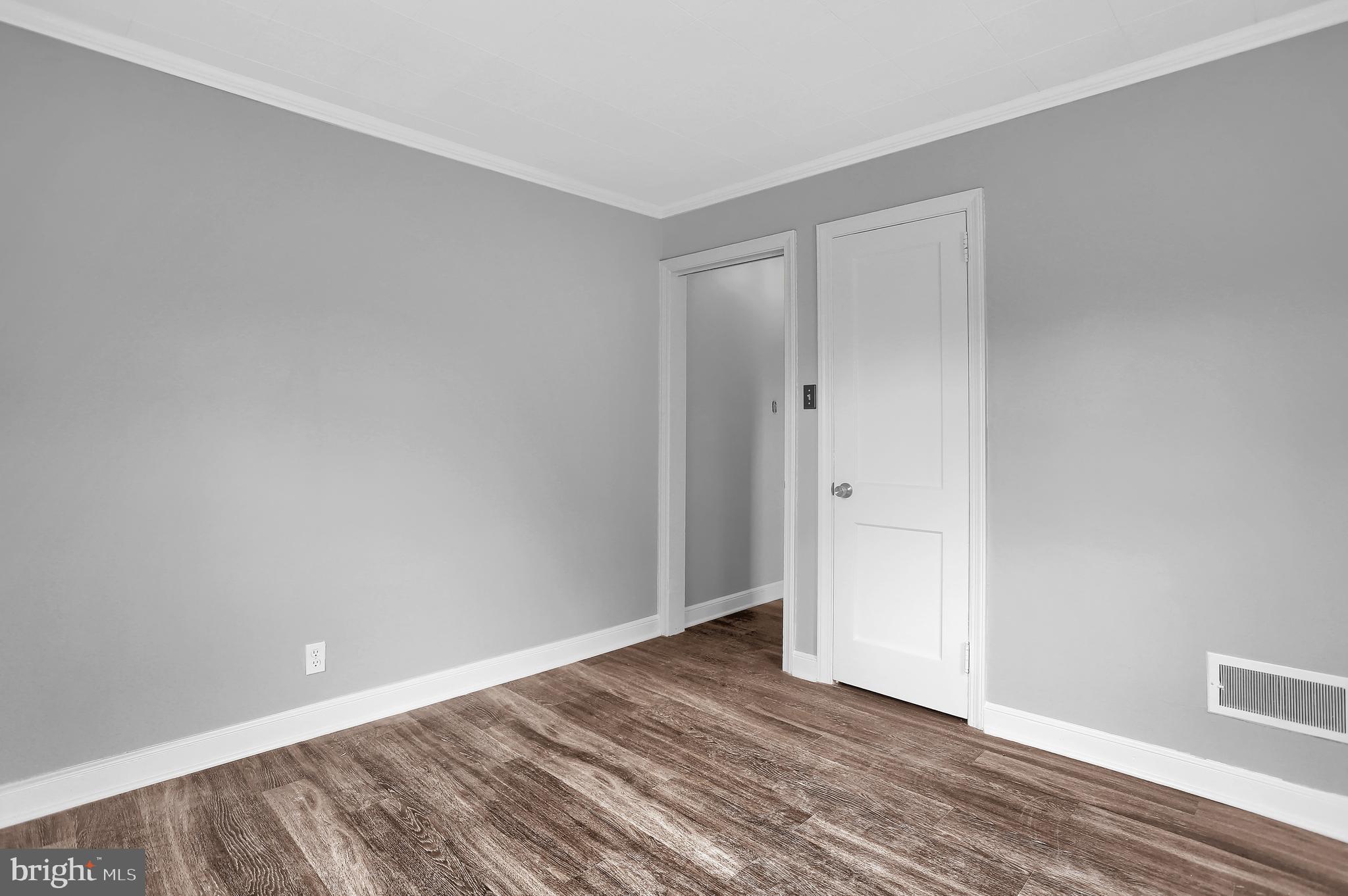 392 Waters Road York, PA 17403 - Photo 24 of 43 a view of an empty room with wooden floor