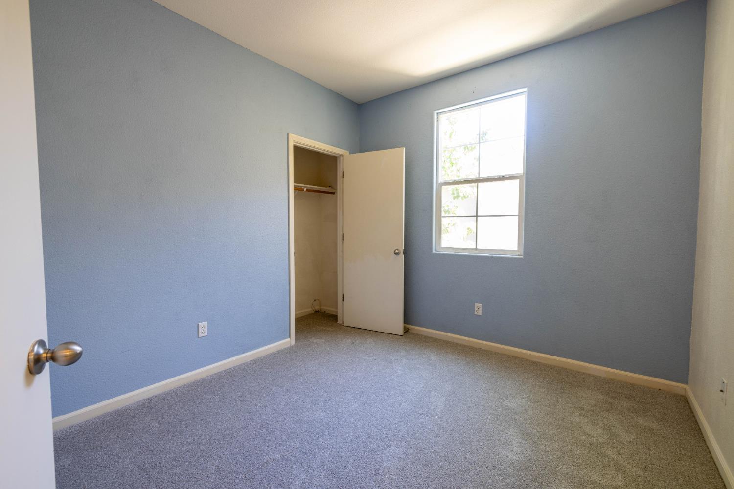 3122 Lea Sterling Way Rancho Cordova, CA 95670 - Photo 20 of 31 an empty room with windows and closet