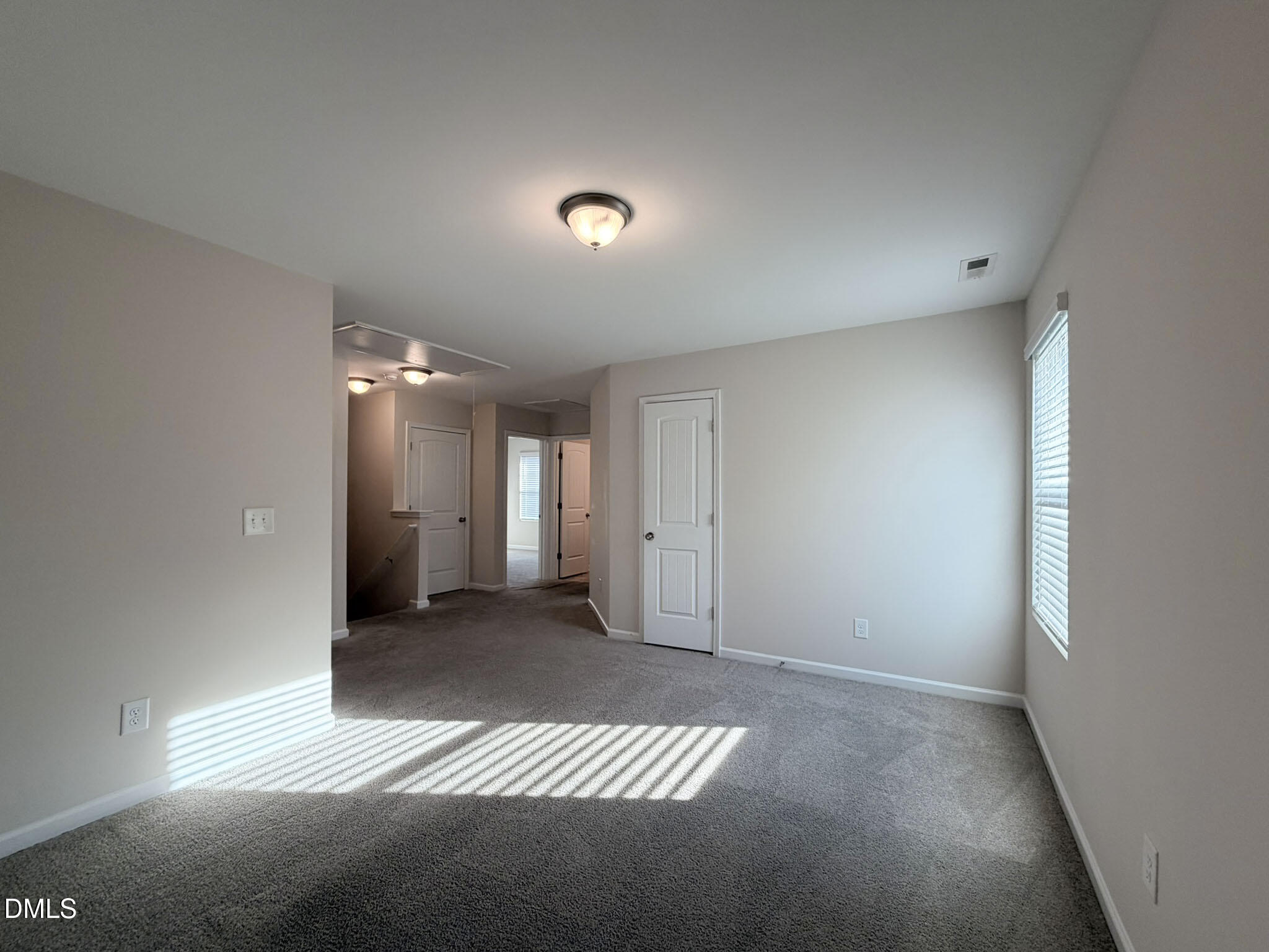 2801 Killian Court Raleigh, NC 27610 - Photo 12 of 26 a view of a livingroom with a staircase