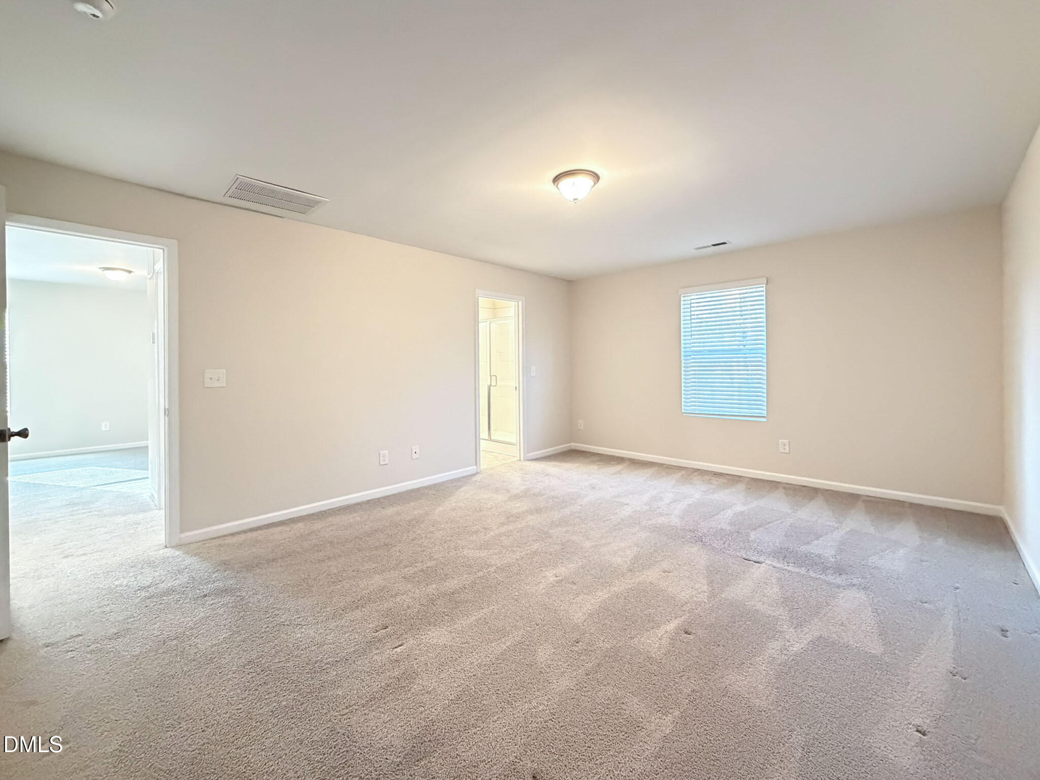 2801 Killian Court Raleigh, NC 27610 - Photo 19 of 26 an empty room with a empty space and windows