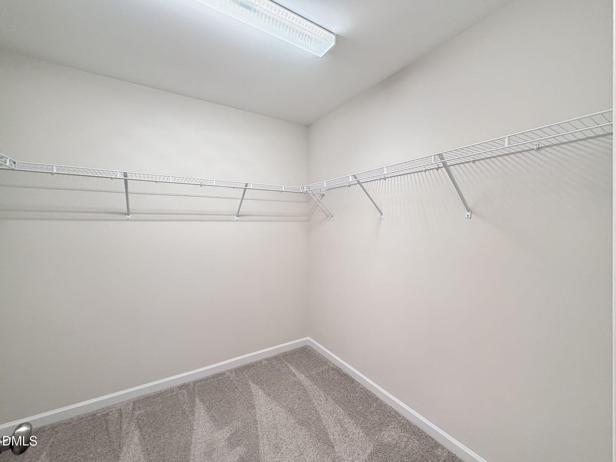 2801 Killian Court Raleigh, NC 27610 - Photo 23 of 26 a view of a room with racks on the wall