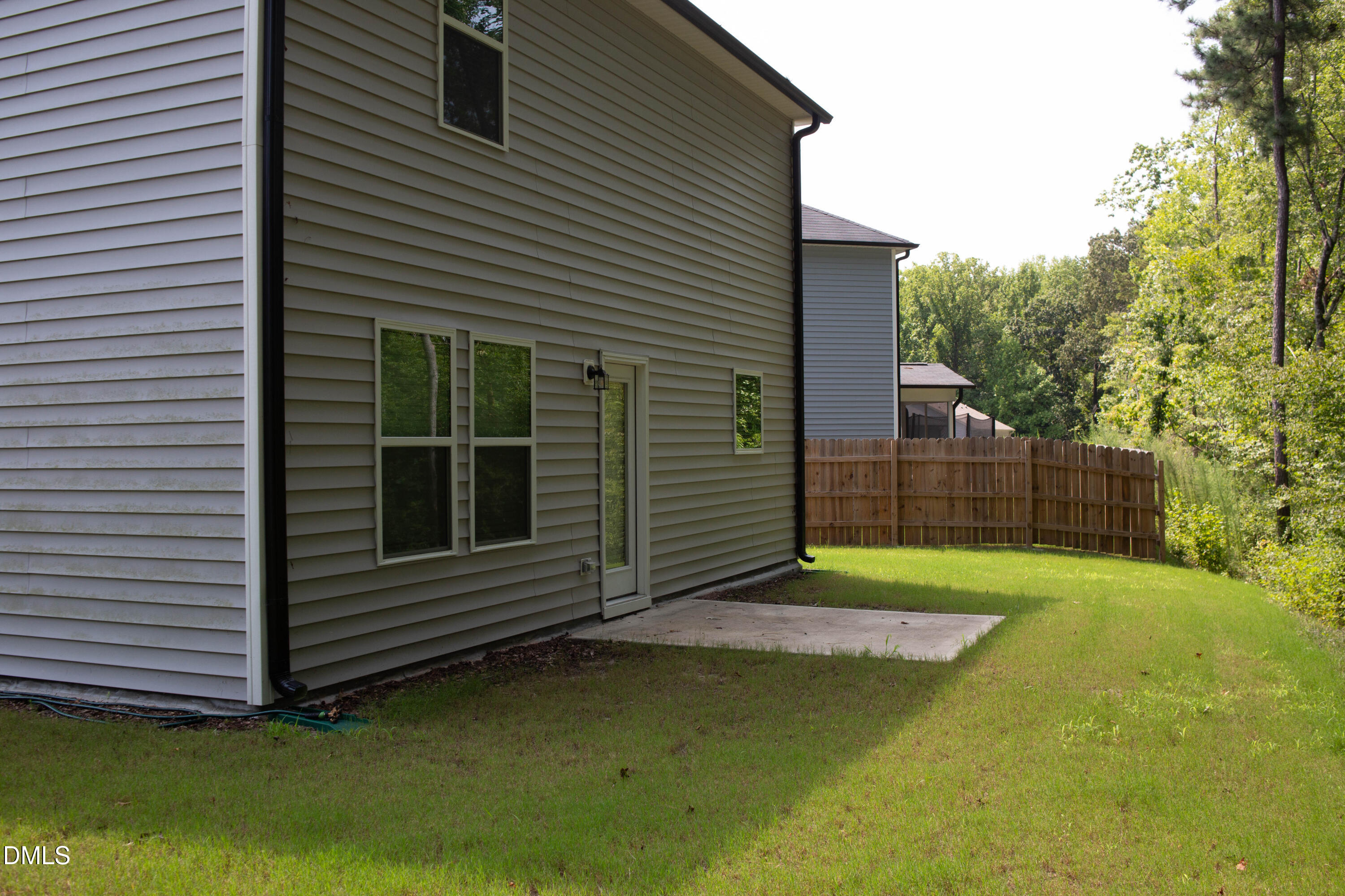 2801 Killian Court Raleigh, NC 27610 - Photo 25 of 26 a view of a backyard with a small cabin