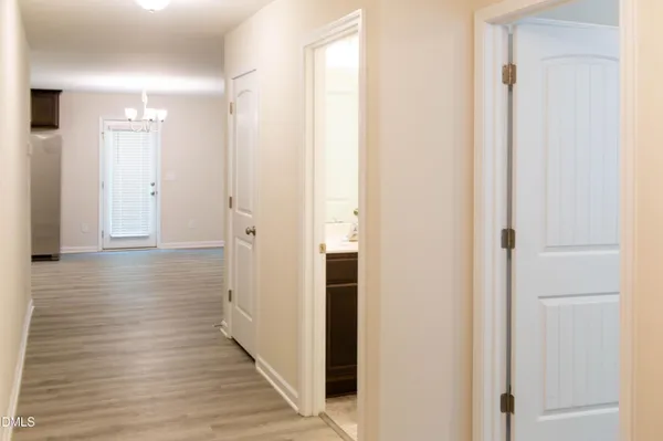 a view of a bathroom from the hallway