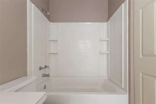 a bathroom with a bathtub