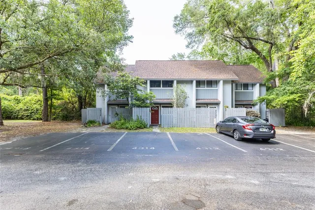 a car parked in front of a house