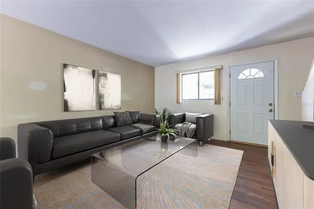 a living room with furniture and a couch