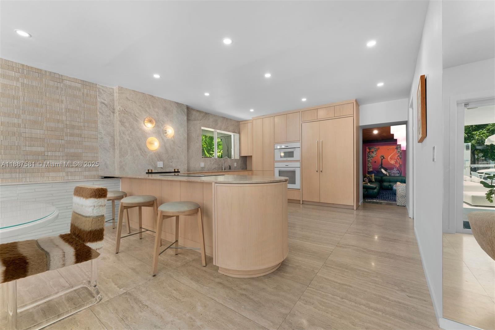 1250 Northeast 87th Street Miami, FL 33138 - Photo 15 of 53 a kitchen with a sink and refrigerator