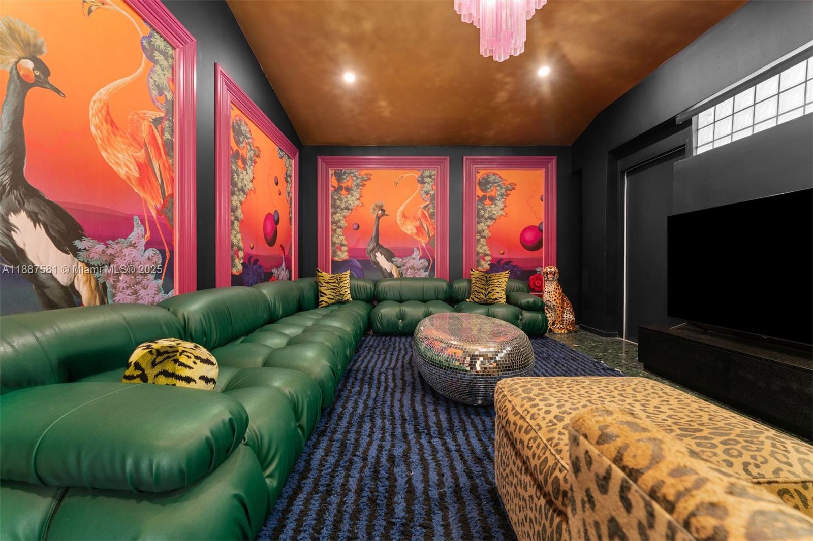 1250 Northeast 87th Street Miami, FL 33138 - Photo 17 of 53 a living room with a couch and a flat screen tv