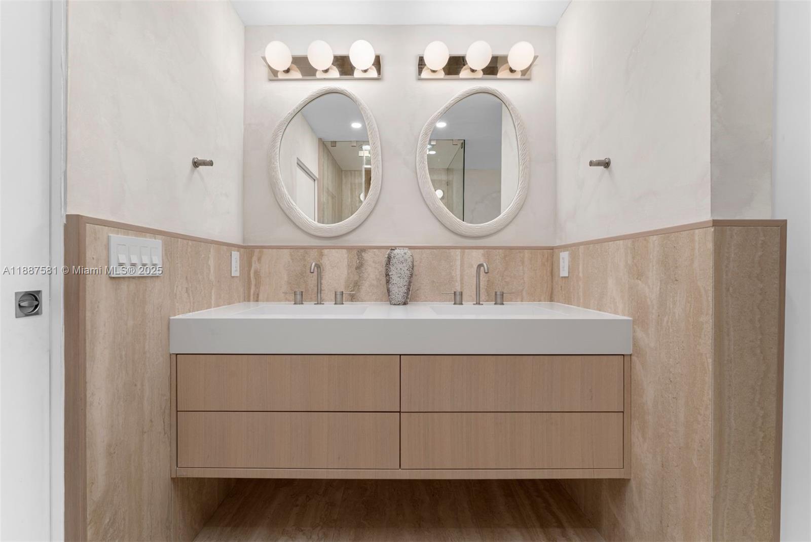 1250 Northeast 87th Street Miami, FL 33138 - Photo 25 of 53 a bathroom with a sink and a mirror