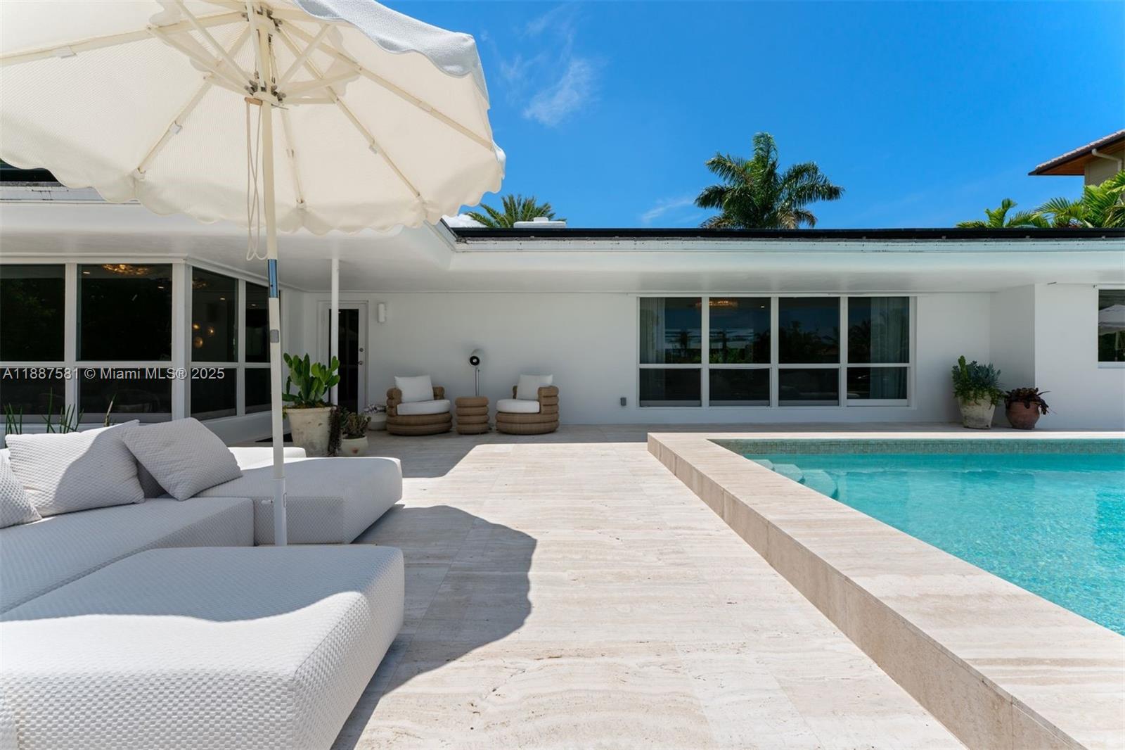 1250 Northeast 87th Street Miami, FL 33138 - Photo 28 of 53 a view of a couches in front of a house