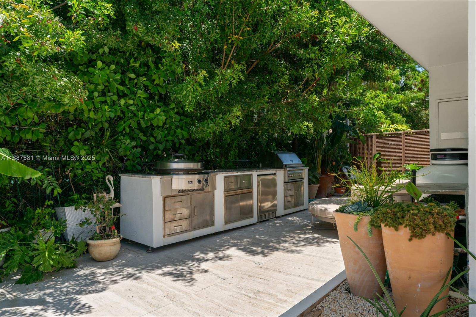 1250 Northeast 87th Street Miami, FL 33138 - Photo 35 of 53 a view of a backyard with sitting area
